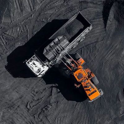 Aerial view of a haul truck being loaded at a coal mine