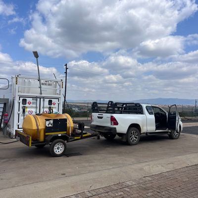 TMP bakkie towing a diesel bowser at a refuelling depot