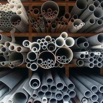Racked stacks of steel and HDPE pipes